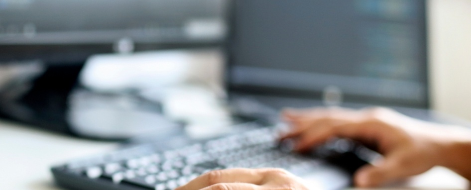 Managed IT services - User on computer keyboard