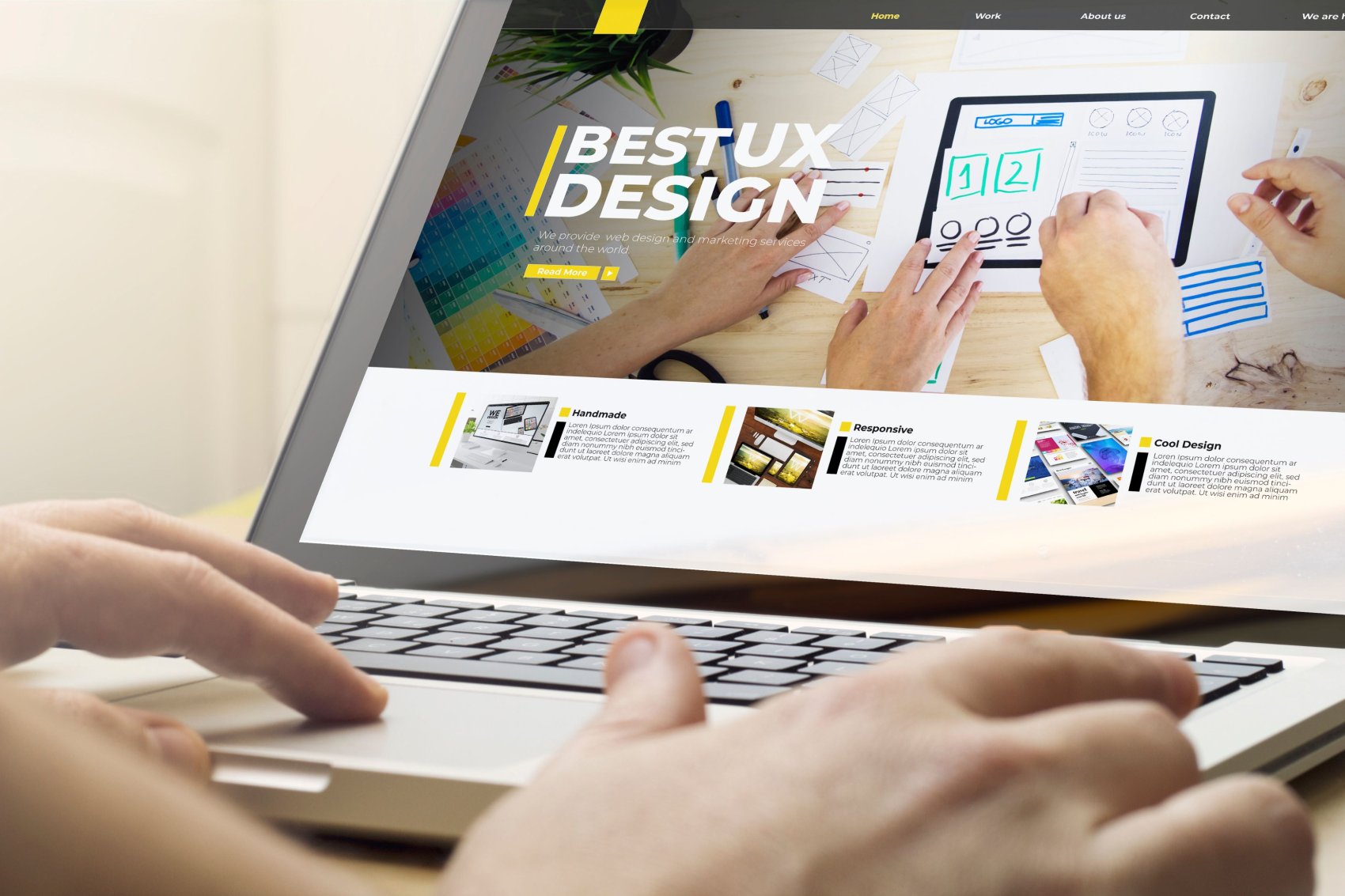 Person browsing a UX design website on a laptop, featuring sections titled 