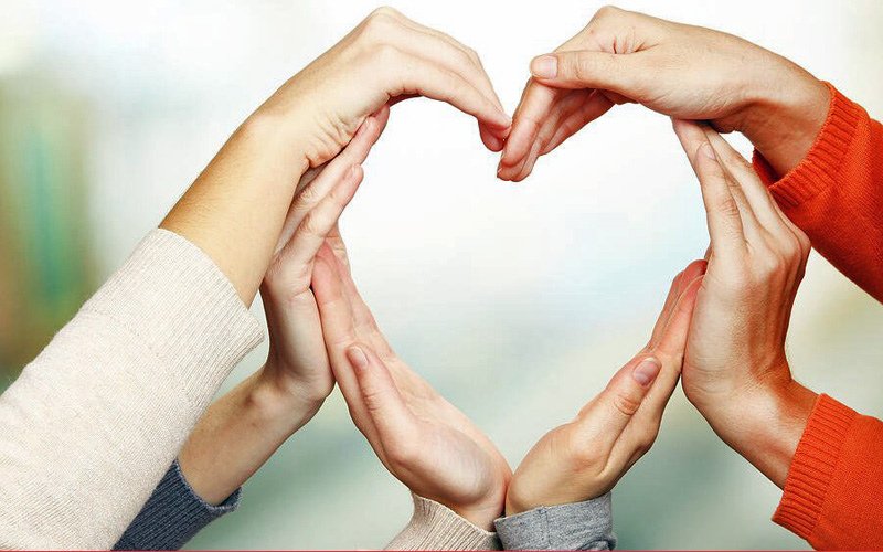 love hearts made from sets of hands