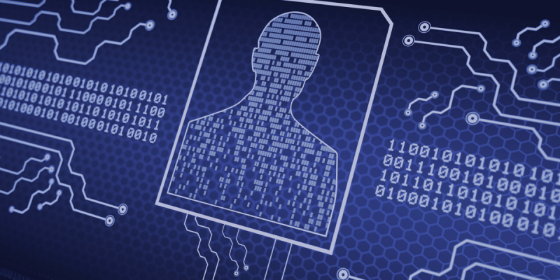 Business professional using a laptop while cyber security threat indicators highlight the risk of phishing and human error.